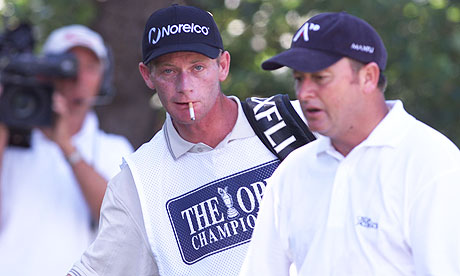 Ian Woosnam and his caddie Miles Byrne walk away from the second tee