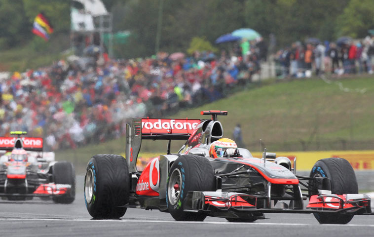 Lewis Hamilton lead Jenson Button at the Hungarian Grand Prix