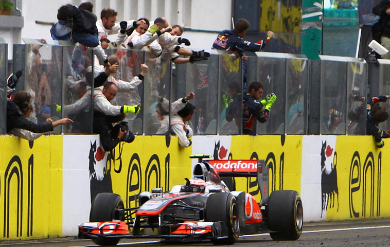 Gallery: Button is congratulated by his pit crew
