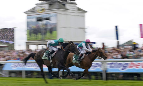Twice Over beats Midday in the Juddmonte International