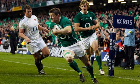 Ireland's Brian O'Driscoll runs with the ball 
