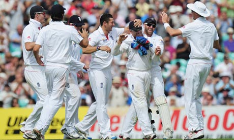 Ian Bell is congratulated by his England team-mates
