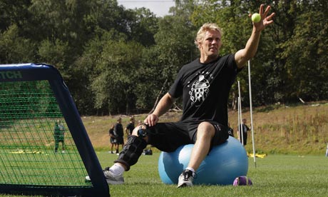 Lewis Moody with a protective brace on his knee during training 