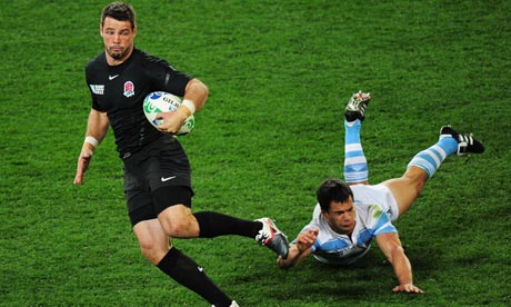 England's Ben Foden skips away from Nicolas Vergallo