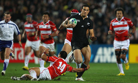 Sonny Bill Williams of New Zealand runs through the Japanese defence in Hamilton.