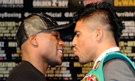 Floyd Mayweather and Victor Ortiz at news conference before their fight in Las Vegas