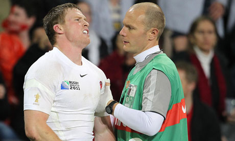 England's Chris Ashton feels the pain of his arm injury