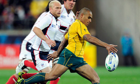 Australia Wallabies captain Will Genia kicks the ball