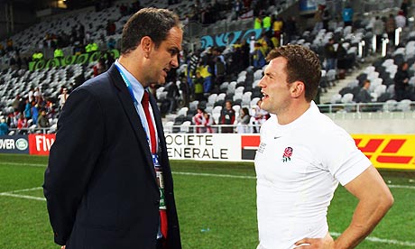 England manager Martin Johnson talks to Mark Cueto