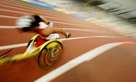 An unidentified athlete competes in the final of Women's 5000m category T54