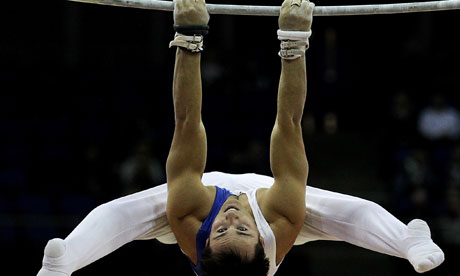 Daniel Keatings of Great Britain in action on the parallel bars.