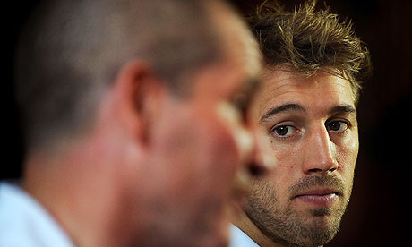 Chris Robshaw looks towards England caretaker coach Stuart Lancaster as the pair faced the media