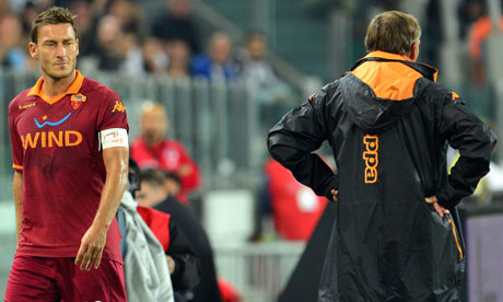 Francesco Totti looks at Zdenek Zeman
