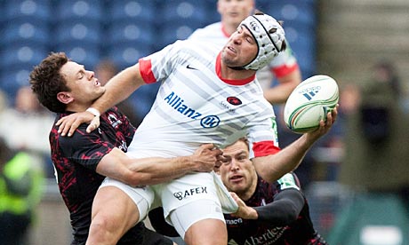 Saracens' Schalke Brits tries to offload the ball