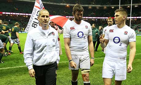 England head coach Stuart Lancaster, left, with Geoff Parling, centre, and Owen Farrell