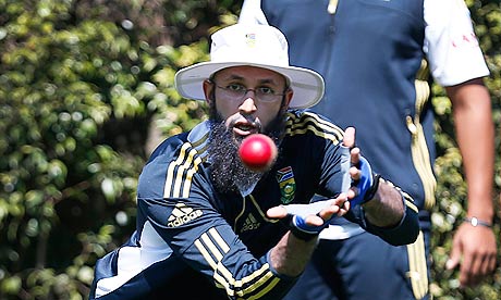South Africa's Amla takes a catch at Sydney Cricket Ground during practice