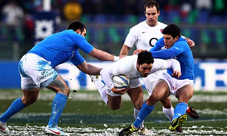 Brad Barritt is tackled by Robert Barbieri