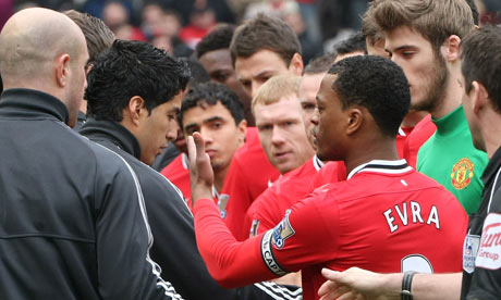 Luis Suarez and Patrice Evra