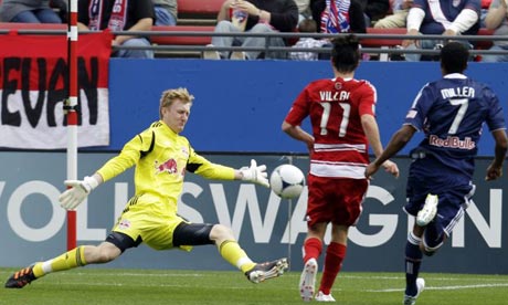 New York Red Bulls goalkeeper Ryan Meara saves from FC Dallas' Ricardo Villar. MLS