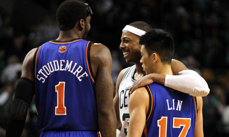 Boston Celtics' Paul Pierce with New York Knicks' Jeremy Lin and Amar'e Stoudemire