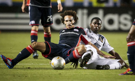 LA Galaxy's Edson Buddle and New England Revolution's Kevin Alston