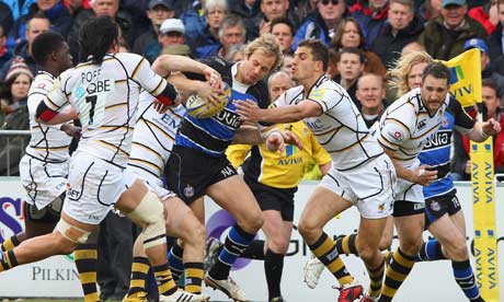 Bath’s Nick Abendanon of Bath feels the force of the Wasps defence during their match