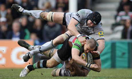 Mike Brown of Harlequins feels the full force of Leicester's George Skivington