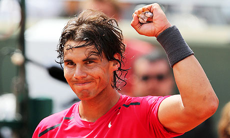 Rafael Nadal salutes the