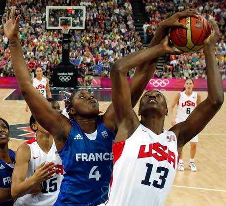 Sylvia Fowles attacks during the women's gold-medal basketball game against France