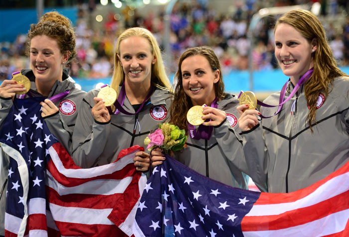 Allison Schmitt, Dana Vollmer, Rebecca Soni and Missy Franklin pose after winning the 4x100 medley