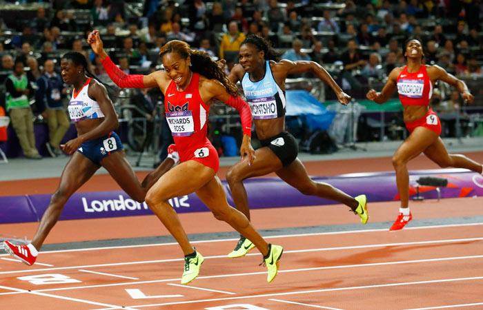 Sanya Richards-Ross celebrates her 400m victory as she crosses the line.