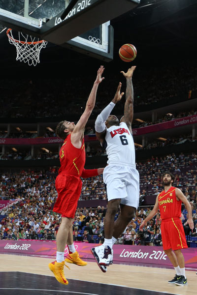 Lebron James of the USA takes on Pau Gasol of Spain in the basketball gold-medal match
