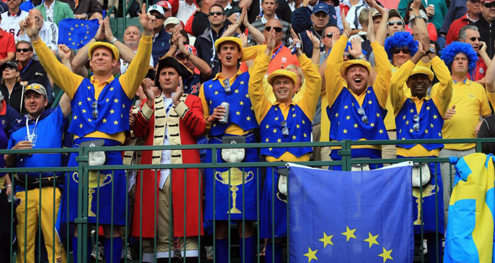 European fans – including an obligatory redcoat – greet the start of the afternoon fourballs