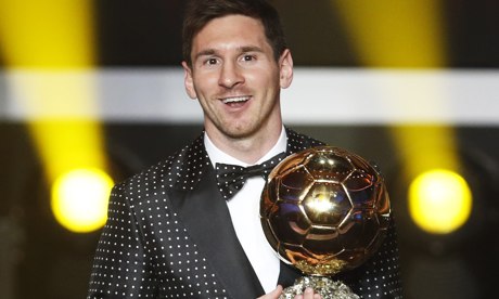 Lionel Messi with the Ballon d'Or