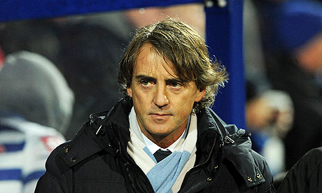 Roberto Mancini, the Manchester City manager, believes Manchester United's lead will be cut