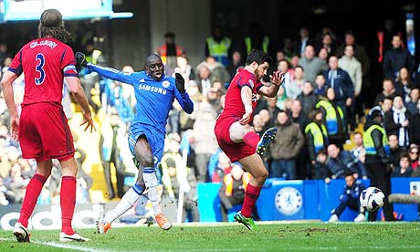Chelsea striker Demba Ba, left, scores the opening goal against West Bromwich Albion