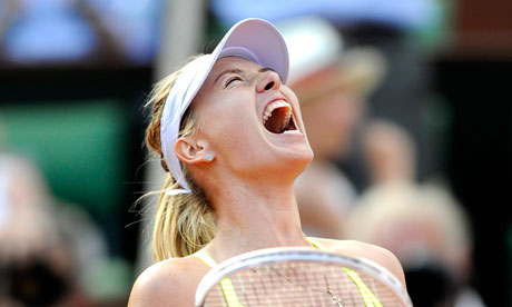 Maria Sharapova celebrates her French Open semi-final win against Victoria Azarenka