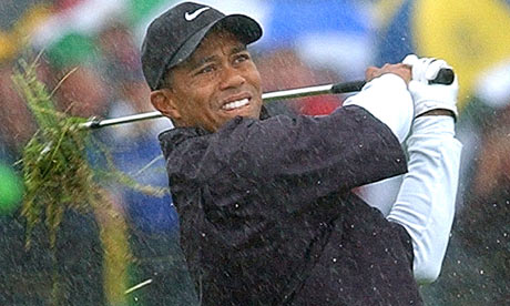Tiger Woods plays from the rough on the first hole during round three of the 2002 Open