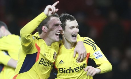 Craig Gardner and Adam Johnson celebrate Sunderland's shootout success.