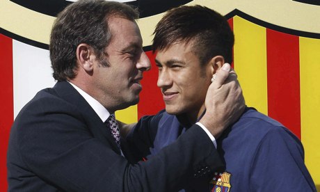 Sandro Rosell embraces Neymar upon the Brazilian's arrival at Barcelona last June