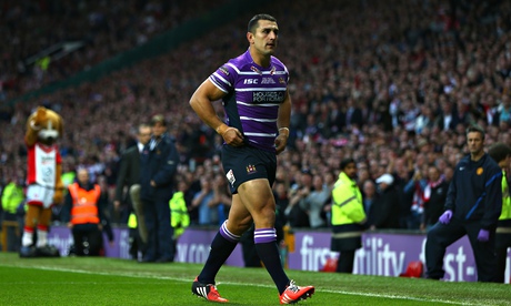 Ben Flower walks from the pitch after receiving a red card in Wigan's Grand Final loss to St Helens