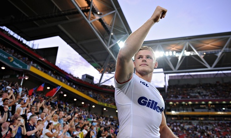 England's Tom Burgess celebrates after the win over Samoa