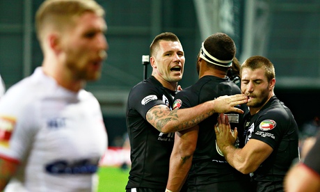 Manu Vatuvei of New Zealand is congratulated after scoring a try in the narrow win over England