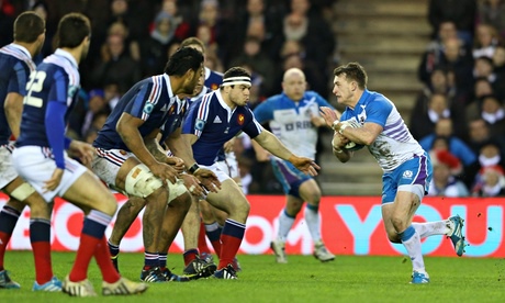 Stuart Hogg of Scotland takes on the French defence