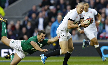 Mike Brown, right, makes a breaks past Rob Kearney during England's victory over Ireland last month