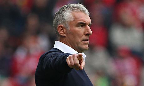 Hamburg's head coach, Mirko Slomka, faces a tough task to ensure his club's top-flight status.