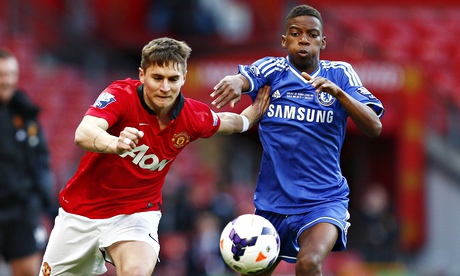 Manchester United's Guillermo Varela tries to keep Charley Musonda of Chelsea at arm's length.