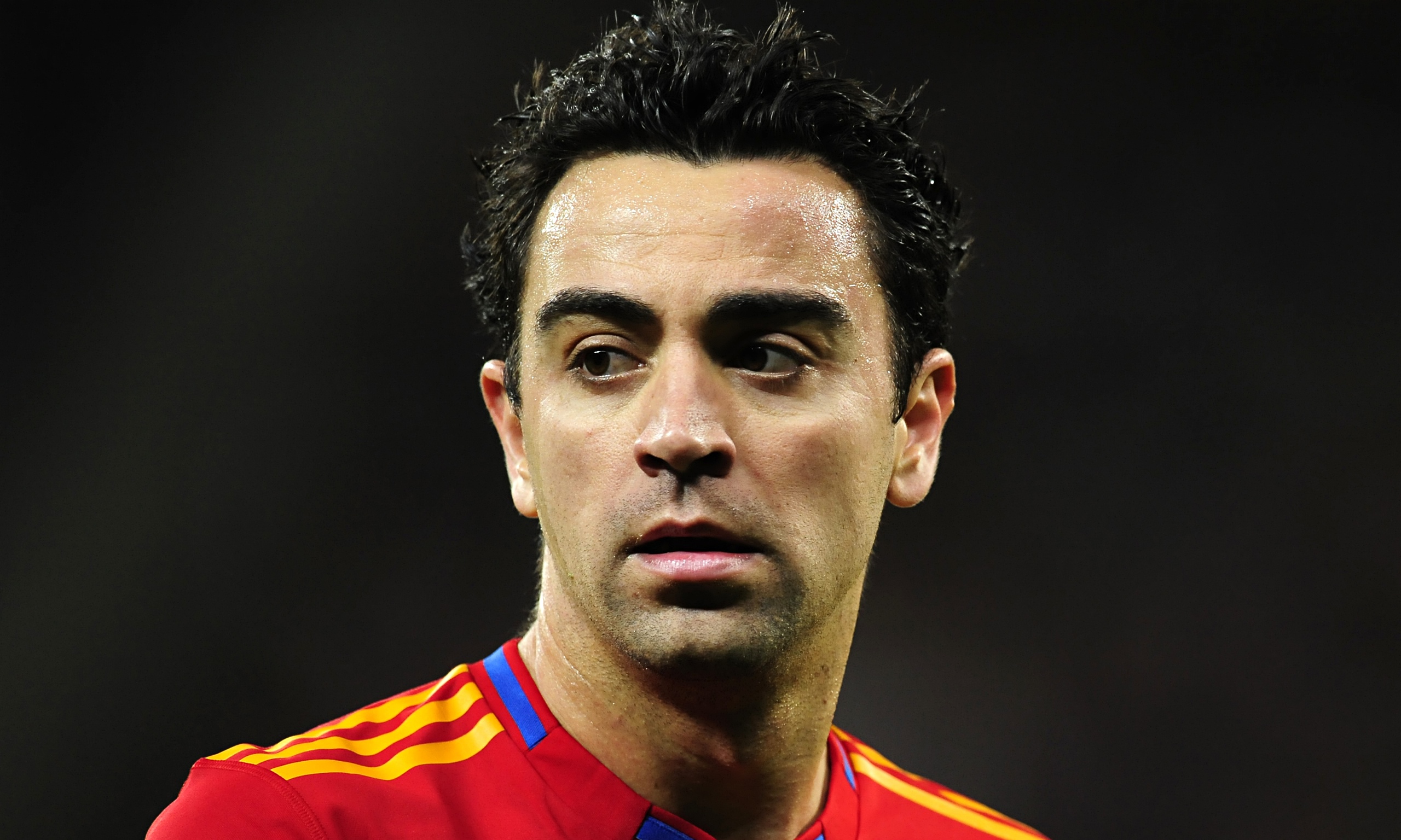Spain midfielder Xavi announces his retirement from international