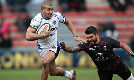 Yann David of Toulouse, right, struggles to lay a hand on the elusive Bath centre Jonathan Joseph.