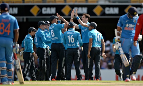 Steven Finn of England celebrates with his team-mates 